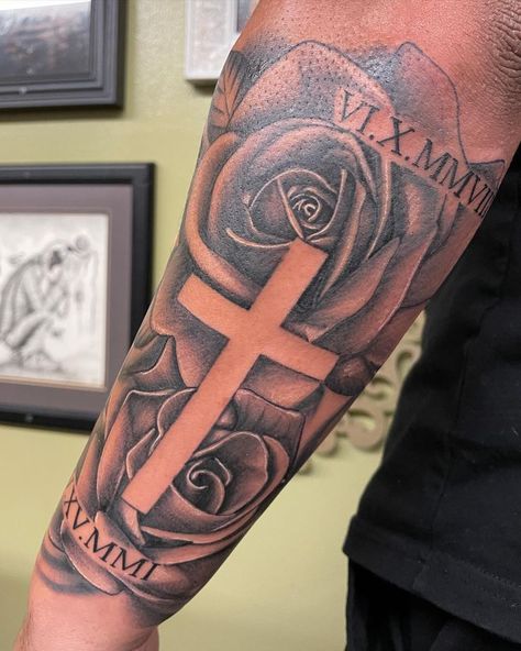 Are you looking for a stylish cross tattoo for men that will show you as a religious person? Top 15 cross tattoos ideas and ideal places for such body art. Cross And Roses Tattoo For Men, Rose And Cross Tattoos For Men, Cross Forearm Tattoo Men, Outer Forearm Tattoo Men Ideas, Tattoo Ideas For Men Cross, Cross Tattoos Men, Cross Tattoos For Men Forearm, Memorial Tattoo Sleeves, Rose Cross Tattoo