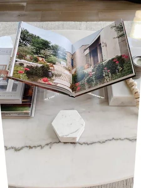 Book stand to decorate our home and display our coffee table books. Love this acrylic one and also linking a black x book stand. I love this as coffee table decor with our marble coasters and other decorative accents. #LTKhome #LTKstyletip Open Book Coffee Table Decor, Coffee Table Book Stand, Book Stand Decor, Round Coffee Table Styling, Coffee Table Books Decor, Acrylic Holders, Coffee Table Decor, Extension Ideas, Book Stand