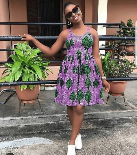 Sleeveless African Print Pleated Dress With White Sneakers | Clipkulture | Clipkulture Ankara Sundress, Ankara Short Gown Styles With Sneakers, Dress With White Sneakers, Ankara Short Gowns, Style Collab, Short Ankara Dresses, Print Pleated Dress, African Print Jumpsuit, Sneaker Ideas