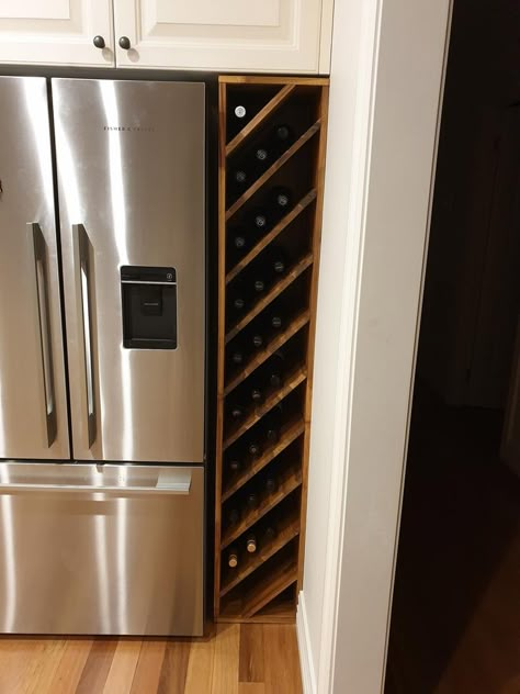 DIY wine rack to fill space next to fridge (updated) - Album on Imgur Wine Rack Next To Fridge, Wine Rack Beside Fridge, Wine Rack Around Fridge, Wine Storage Apartment, Bottle Rack Diy, Space Next To Fridge, Next To Fridge Storage, Wine Rack Inspiration, Diy Wine Rack Projects