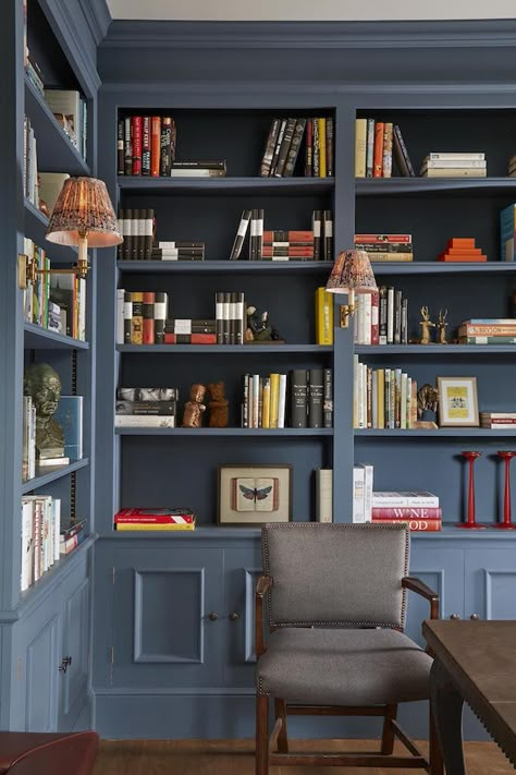 Designed to complement the Georgian architecture we had the joinery, that wraps around this library, painted in Farrow and Ball’s Stiffkey Blue. The colour elevates the solid oak bookcase and gives the room a masculine grandeur. Blue Library, Blue Bookcase, Office Paint Colors, Stiffkey Blue, Open Plan Kitchen Diner, Office Paint, Reference Board, Paint Sample, Sample Board