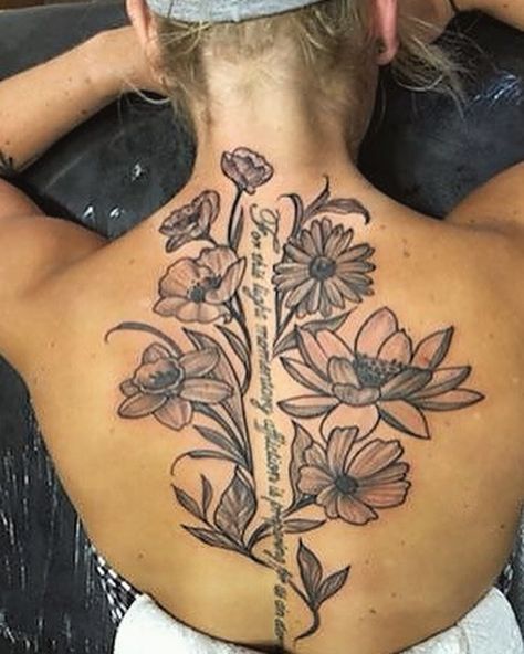 Flower tattoo Godly Back Tattoos, Full Back Flower Tattoo, Elegant Spine Tattoos For Women, Elegant Spine Tattoos, Spine Tattoo Designs, Flower Spine Tattoo, Flower Spine Tattoos, Bible Verse Tattoos, Verse Tattoos