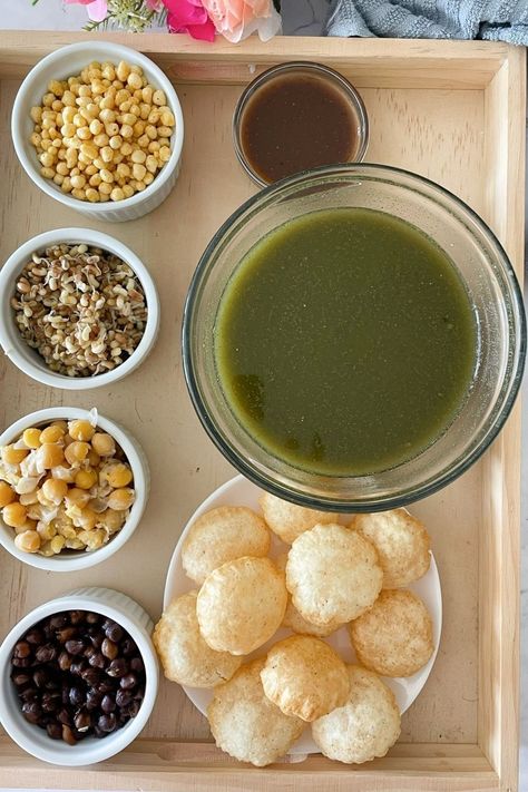 Enjoy the flavor explosion of homemade Pani Puri, a delightful Indian street food! Crispy puris filled with tangy tamarind water, spicy mint chutney, potatoes, and chickpeas for a refreshing treat. Street Indian Food, Pani Puri Filling Recipe, Pakistani Snacks, Pani Puri Water, Golgappa Recipe, Tamarind Water, Pani Puri Recipe, Mint Chutney, Puri Recipes