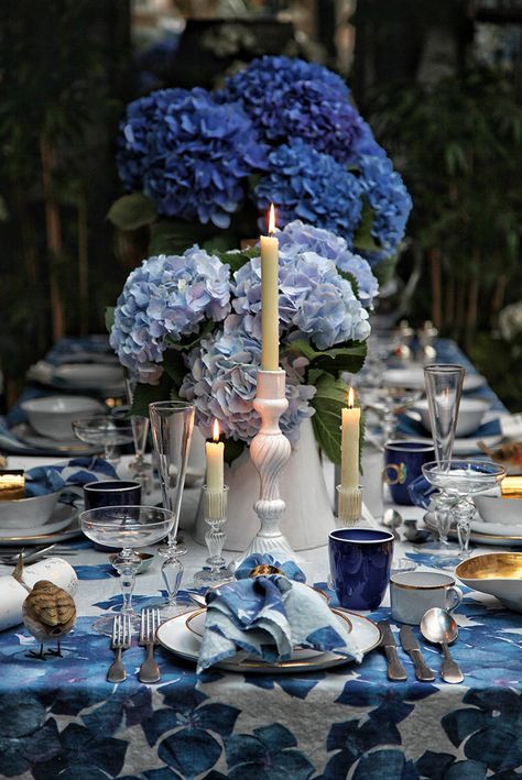 Introducing ‘Hydrangea’ - our ode to a forget-me-not summer. Designed in collaboration with textile artist Chiara Grifantini, together we sought our inspiration from the blossoming and bountiful hydrangeas planted within the communal gardens of Notting Hill. Crisp white forms an elegant backdrop to exuberant inflorescences in chalky shades of blue, printed onto a 100% pure linen. This tablecloth is the ultimate floral statement, for the happiest of tables, perfect for providing that distinctive Elegant Backdrop, Chic Candles, Its Christmas Eve, Planting Hydrangeas, Winter Dinner, Summer Tables, Blue Table, Spring Table, Handmade Textiles