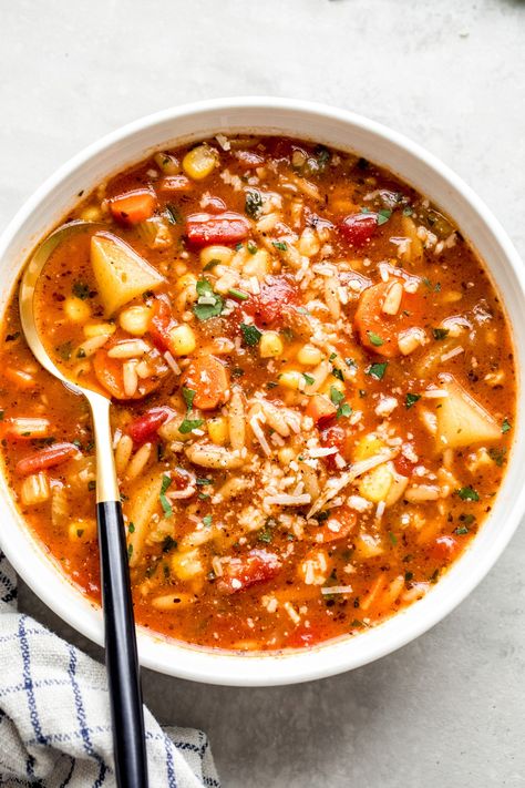 Hearty vegetable soup with orzo, corn, and potatoes. #vegetableorzosoup #vegetablesoup #vegetarian Vegetable Orzo Soup, Soup With Orzo, Vegetable Orzo, Corn And Potatoes, Veggie Soup Recipes, Orzo Soup Recipes, Hearty Vegetable Soup, Orzo Soup, Vegetarian Soup Recipes