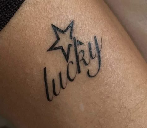 Y2k Tattoo Aesthetic, Grunge Stomach Tattoos Women, Y2k Word Tattoo, Hand Tattoos Numbers, 2x3 Tattoo Ideas, Lucky Me Tattoo, Lucky Tattoo Word, Small Y2k Tattoos, Lucky Star Tattoo