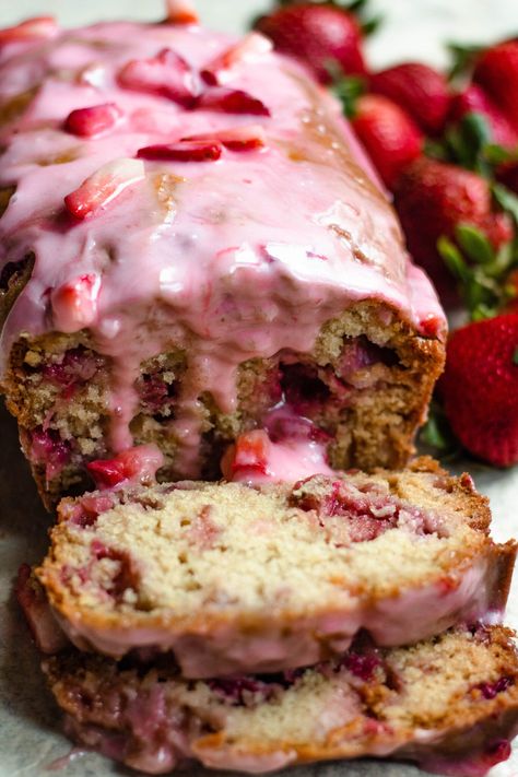 This Strawberry Bread Recipe is similar to banana bread but is made with fresh strawberries. It’s then topped with a delicious, pink strawberry glaze. This recipe is perfect for a spring or summer snack and can be enjoyed as a breakfast treat or a fruity dessert! Strawberry Bread Recipe, Carrot Loaf, Strawberry Bread Recipes, Loaf Breads, Banana Zucchini, Fruity Dessert, Zucchini Carrot, Fresh Strawberry Recipes, Fruit Banana