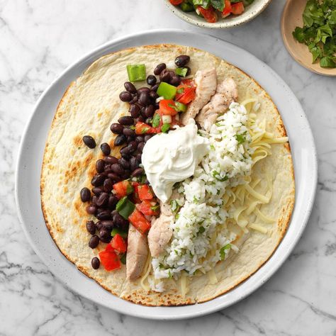 Burritos are the perfect dinner for the whole family, especially this quick and easy recipe. Don't be afraid to load up your air-fryer burrito with pork, beans, cheese and rice. —Fiona Seels, Pittsburgh, Pennsylvania Reheat Turkey, Pork Burritos, Burrito Bar, Bean Rice, Recipe Pork, Boneless Pork Loin, Recipes Thanksgiving, Burritos Recipe, Air Fryer Dinner Recipes