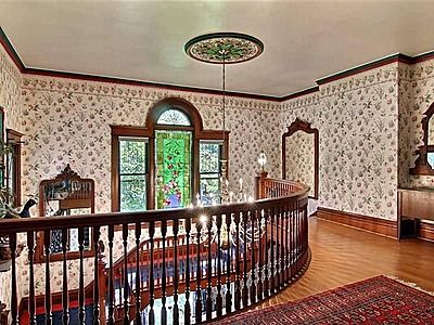 Beautiful central staircase in 1880 victorian home. Multiple pictures of it. 105 E South St, Crown Point, IN 46307 Victorian Hardwood Floors, Intricate Woodwork, Leaded Windows, Victorian Queen, Old House Interior, Bedroom Victorian, Victorian Home Interior, Victorian Interiors, Refinishing Hardwood Floors