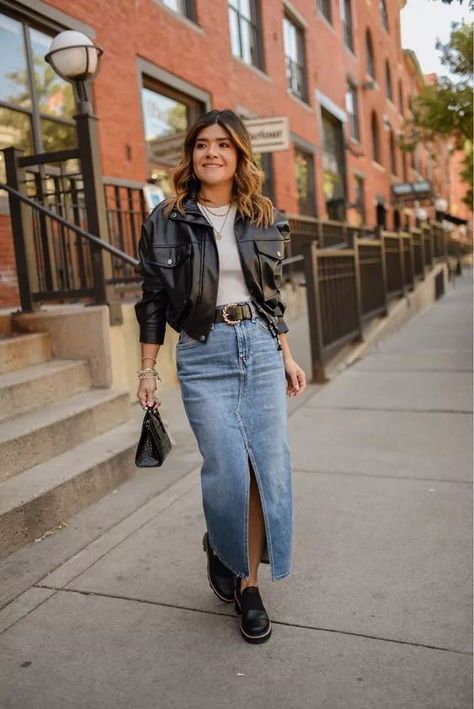 Denim and leather are always a good pair! CHIC TALK today is sharing how you can style a denim jean maxi skirt this winter. She pairs it with a leather jacket and leather black shoes. Shop this entire outfit and follow for more winter fashion trends, casual chic outfit, and elevated fashion. (I make commissions for purchases made through the link in this pin) All Denim Skirt Outfit, Edgy Denim Skirt Outfit, Jean Skirt Boots Outfit, Denim Skirt And Jacket Outfit, Fall Jean Skirt Outfits, Denim Skirt Winter, Jean Skirt Outfits Fall, Skirt Boots Outfit, Maxi Skirt Work