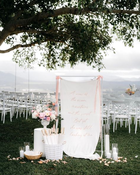 Styled wedding ceremony of our dreams! 🤍 Capturing the essence of ‘Love is love’. All the incredible details from the bows, to the candles, to the florals 🌸 it was a beautiful afternoon and we are so proud to have been apart of it 🫶🏼 Bridal attire: @gladstonebridalboutique Wedding rings: @gladstonebridalboutique Suit: @stewarts_rockhampton Hair: @jessie_dulcethairdressing Makeup: @blissbeautybytayla Stationary: @fielding_milligan Florals: @shannonhawkesartisanflorals Cake: @cakesbyteg... Fabric Sign, Bridal Attire, Printed Linen Fabric, Garden Wedding Decorations, Grey Skies, Wedding Welcome Signs, Wedding Welcome, So Proud, Printed Linen