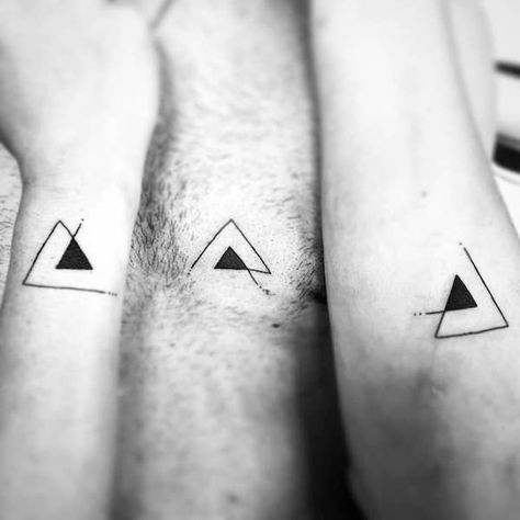 79 Sibling Tattoos To Get With Brothers And Sisters Triangle Sibling Tattoos For 3, Christian Sibling Tattoos, Gender Neutral Sibling Tattoos, Three Sibling Tattoos Simple, Sibling Tattoos Minimalist, Triple Tattoo Friends, Unique Sibling Tattoos For 3, Small Sibling Tattoos For 3, Connected Tattoos