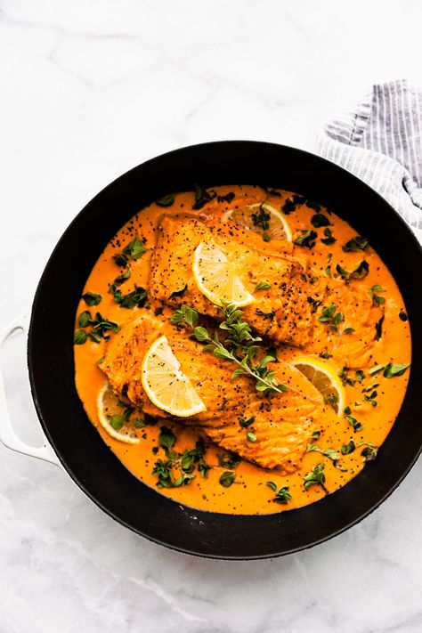 Baked salmon with Red Pepper Sauce! Baked salmon is a nutritious, delicious meal on its own, but it's even better with a dreamy, creamy roasted red pepper sauce on top! This one-pan salmon recipe is the perfect dinner to make again and again! Great for holidays, date night in, family gatherings, or any occasion! #salmon #keto #healthy #sugarfree #dinner #easyrecipe Creamy Roasted Red Pepper Sauce, Salmon Keto, Pan Salmon, Paprika Sauce, Roasted Red Pepper Sauce, Oven Baked Salmon, Frozen Salmon, Easy Grilled Chicken, Red Pepper Sauce