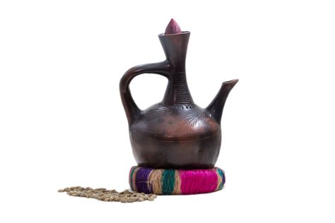 Jebena- traditional coffee pot from Ethiopia, with coffee beans. Used to pour fresh coffee. Made from clay. Jebena Coffee Ethiopia, Coffee Ethiopia, Ethiopian Coffee Ceremony, Starbucks Shop, Vacuum Container, Caribou Coffee, Ethiopian Coffee, Caffeine Addict, Fresh Coffee Beans