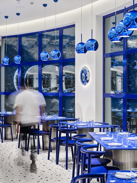 THICK by Studio adot on Behance Blue Booth Design, Blue Restaurant Interior, Project Mc, Blue Cafe, Blue Interior Design, House Cafe, Green Bar, Cafe Shop Design, Blue Bar