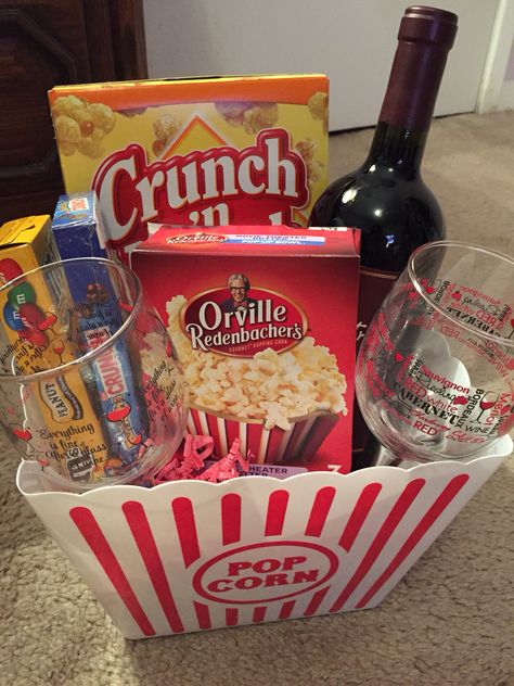 Movie night basket! Gift basket ideas, Christmas gift too Couples Movie Night Gift Basket, Movie Date Basket Ideas, Fun Raffle Ideas, Date Night Basket Ideas Couple, Date Night Gift Basket Ideas Couples, Movie Basket Ideas, Movie Night Basket Ideas, Couples Gift Basket Ideas, Movie Gift Basket Ideas