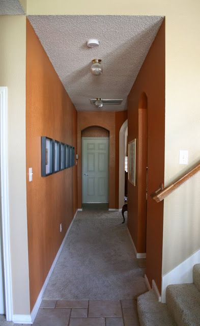 Orange Hallway Ideas, Burnt Orange Hallway, Hallway 2023, Orange Hallway, Red Hallway, Painted Hallway, Arranging Furniture, White Hallway, Hallway Door