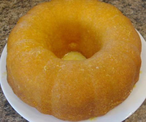 Tart Lemon Jello Bundt Cake: 1 pkg yellow cake mix,  1 small pkg lemon jello, 3/4 c water,  4 eggs, 3/4 c oil,  2 c powdered sugar, 1/2 c lemon juice. Jello Bundt Cake, Lemon Jello Cake, Orange Juice Cake, Jello Cake, Dessert Parfait, Lemon Jello, Lemon Bundt Cake, Mini Bundt, Mini Bundt Cakes