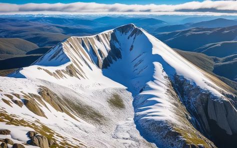 Discover Mount Kosciuszko, Australia's loftiest peak at 7,310 feet, nestled in the iconic Snowy Mountains of New South Wales – a breathtaking natural wonder. Mt Kosciuszko Australia, Mount Kosciuszko, Snowy Mountains, South Wales, New South Wales, Natural Wonders, Wales, Australia, Wonder