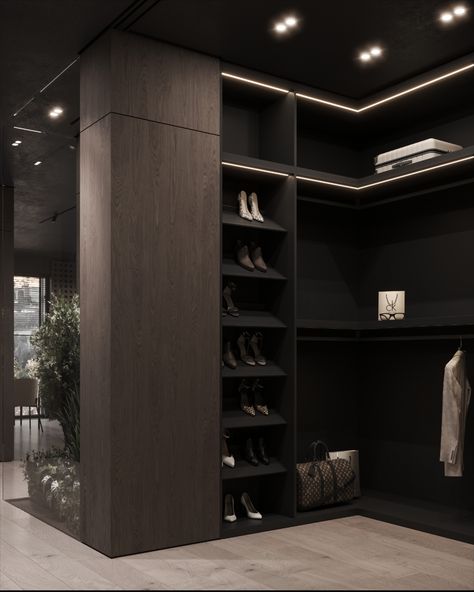 Walk-in closet in black Dark Modern Walk In Closet, Dark Walk In Wardrobe, Black And Wood Wardrobe, Dark Walk In Closet, Dark Dressing Room, Modern Mansion Exterior, Small Walk In Closet Design, Black Hallway, Small Walk In Closet