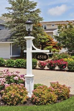 25+ Best Driveway Lighting Ideas and Designs For Your Outdoor (2022) Driveway Lamp Post, Driveway Light Post, Driveway Lighting Ideas, Light Post Landscaping, Driveway Posts, Outside Lamps, Solar Driveway Lights, Driveway Lights, Driveway Entrance Landscaping