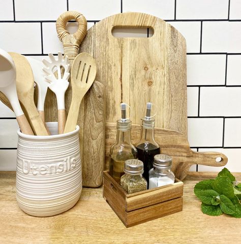 🌟 Bring elegance to every meal with our exclusive 4-piece condiment set! Featuring two glass pouring bottles and two shakers, neatly housed in a chic wooden crate, this set is designed to complement any dining decor. 🍽️ Why you'll love it: ✔️ Stylish and functional – perfect for oils, vinegars, and spices ✔️ Durable glass and a rustic wooden crate combine for a timeless look ✔️ Ideal for dinner parties or everyday elegance Elevate your dining experience with a touch of sophistication. Shop ... Pepper Vinegar, Kitchen Decor Styles, Different Types Of Dresses, Condiment Sets, Hanging Clock, Clock Wall Art, Flower Spray, Wood Crates, Dinner Dress