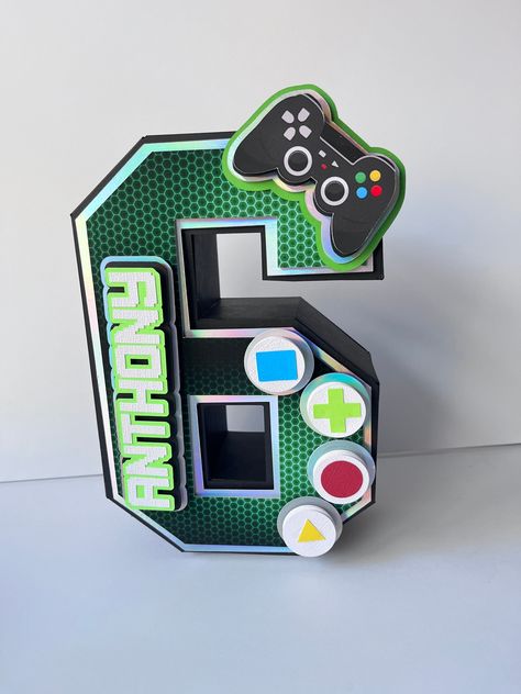 Gamer 3D Letters, Gamer Party Decorations, Gamer Birthday Party, Gamer Room Decor, Video Games Birthday, Gamer theme, Video Games Theme 0001    3D Letters are always a beatiful way to decorate the table at a party and save for keepsake room decor, they simply add a special touch to your spaces.  They can also be created as a unique gift.  Free standing or hanging, these 3D letters give a special and unique touch to your party or room. They are perfect for Gamer Party Decorations, Gamer Room Deco Gaming Birthday Party Centerpieces, Gamer Birthday Party Centerpieces, Gamer Party Snacks, Level 7 Birthday Party, Playstation 5 Party Decorations, Gamer Party Theme, Gaming Theme Party, Gamer Birthday Party Ideas Boys, Gaming Birthday Party Ideas Boys