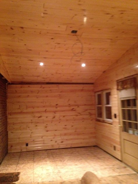 The v-notched pine car siding is all up and the lights are working. Just need to add some the trim and add a ceiling fan and a floor for the room to be finished. Car Siding Ceiling, Porch Remodel, Cabin Ideas, Box Car, Ceiling Fan, Basement, Room Ideas, Shed, Garage Doors