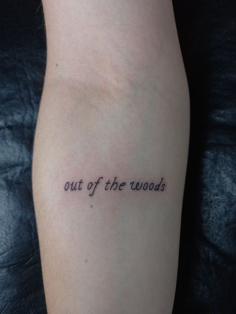 Taylor swift inspired tiny tattoo Taylor Swift Tattoo Out Of The Woods, Into The Woods Tattoo, Out Of The Woods Taylor Swift Tattoo, Out Of The Woods Tattoo Taylor Swift, Wood Tattoo Ideas, Out Of The Woods Tattoo, Taylor Swift Lyrics Tattoo, Taylor Swift Lyric Tattoo, Taylor Swift Tattoo Ideas Lyrics