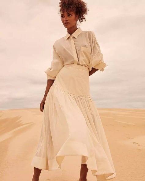 CLOUD DREAMS : Embrace ethereal elegance with our Cloud Co-Ord Set, a versatile treasure in a buttery cream hue. Elevate your style effortlessly with its dreamy softness, perfect for any occasion from casual chic to sophisticated soirées. The perfectly delicate oversized shirt, cut from airy cotton voile in a breezy silhouette and has a poplin front placket and concealed button fastenings for a more streamlined look. Let it hang over the coordinating skirt or tuck it in to enhance your waist.... Ethereal Elegance, Hang Over, Co Ord Set, Cotton Voile, Co Ord, Elevate Your Style, All White, Oversized Shirt, Casual Chic