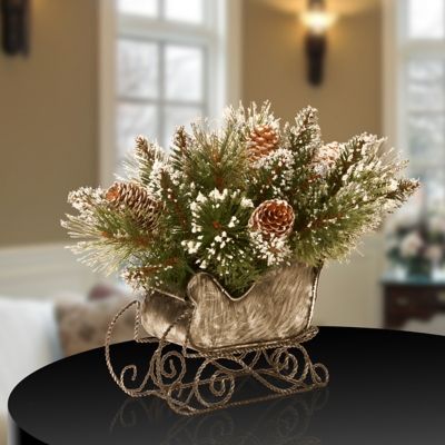 10 in. Glittery Bristle Pine Sleigh | Ashley Furniture HomeStore Christmas Candle Decorations Ideas, Shell Flowers, Winter Decorating, Christmas Candle Decorations, Christmas Flower Arrangements, Fire Places, Christmas Floral Arrangements, Christmas Centerpieces Diy, Christmas Sleigh