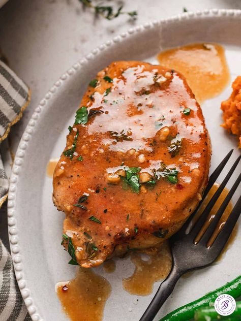 Thick, juicy pork chops are smothered in an incredible silky glaze made with sweet apple cider, tart apple cider vinegar, and tangy mustard in this Pork Chops with Apple Cider Glaze recipe. This dish is so easy to make with top notch results that your entire family will love! Apple Cider Brined Pork Chops, Apple Cider Vinegar Pork Chops, Pork Chops With Apple Cider, Apple Cider Glaze Recipe, Apple Cider Pork Chops, Apple Cider Glaze, Apple Pork Chops, Juicy Pork Chops, Pork Loin Recipes