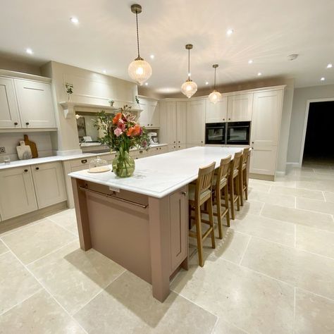 Pale Rose & Putty Burbidge Kitchen. This solid timber door gives the impression of being an authentic in-frame kitchen with a fresh, contemporary twist. With a large scale renovation project on their hands our clients gave us the brief of a timeless, sociable space for the family to gather. We had a complete blank canvas to work with and we are delighted with the result. This elegant design was meticulously crafted by our design team to create a bespoke mantle area with a feature breakfront. Putty Kitchen, Kitchen Island Designs With Seating, Kitchen Island Designs, Shaker Style Kitchen, Functional Kitchen Island, Shaker Style Kitchens, Kitchen Island With Seating, Built In Seating, Timber Door