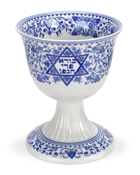 The Kiddush Cup is a beautiful addition to your Sabbath meal. Made of fine porcelain. Holds 6 ounces. Dishwasher, microwave, and freezer safe. Imported. Jewish Blessings, God's Commandments, Jewish Decor, Jewish Symbol, Modern Judaica, Kids Dishes, Blue White China, Kiddush Cup, The Star Of David