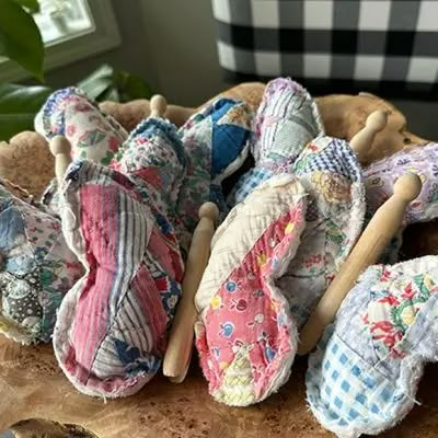 FIRST SIGNS OF SPRING | Shop Sales Events Antique Farmhouse Crafts With Old Quilt Pieces, Vintage Fabric Scrap Projects, Crafts With Fabric Squares, Small Quilted Gifts Simple, Vintage Craft Ideas, Old Quilts Repurposed Ideas, Clothespin Butterfly, Quilt Upcycle, Repurposed Quilts