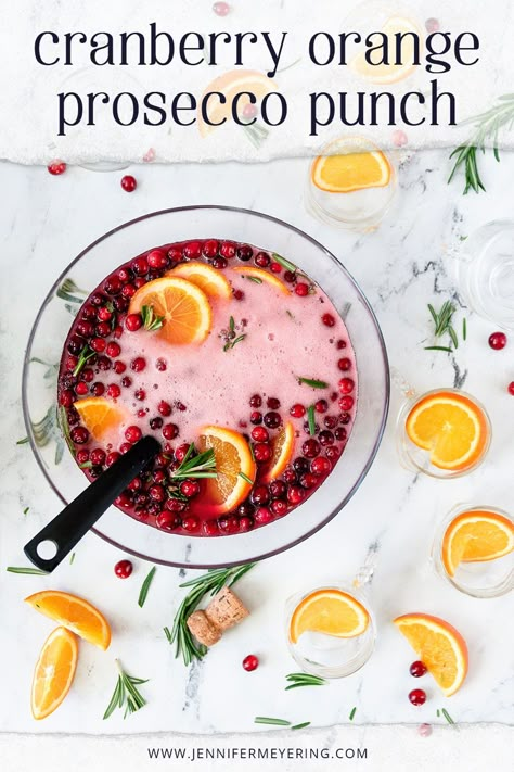 Christmas Punch Recipes Prosecco, Festive Prosecco Cocktails, Christmas Punch Prosecco, Sparkling Christmas Punch, Prosecco And Cranberry Cocktails, Best Christmas Punch Recipes Alcholic, Prosecco Vodka Punch, Cranberry Orange Prosecco Cocktail, Prosecco Christmas Punch