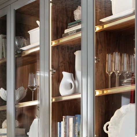 Kingdom Woodworks on Instagram: "⠀⠀⠀⠀⠀⠀⠀⠀⠀
A truly outstanding butlers pantry we designed and built with meticulous attention to detail. Displaying Walnut interiors, glass cabinets that are illuminated inside with brass inlay accents on the shelves and our KW Collection decorative hardware all harmoniously working to make this space a stunner. The cabinets are finished in our gloss finish. 

#KW #Kingdomwoodworks 
⠀⠀⠀⠀⠀⠀⠀⠀⠀
⠀⠀⠀⠀⠀⠀⠀⠀⠀
⠀⠀⠀⠀⠀⠀⠀⠀⠀
#kitchendesign 
#butlerspantry 
#customcabinetry 
#custommade
#luxuryhomes 
#luxuryinteriors 
#bespokedesigns 
#luxurylifestyle
#tailoreddesign
#cabinetrydesign
#tailoredhome
#madeinamerica
#gloss 
#brass
#walnutinterior 
#walnut 
#custom 
#glassdoor 
#lighting 
#cabinetlighting 
#luxuryhomes" Pik 2, Glass Cabinets, Walnut Kitchen, Joinery Design, Butlers Pantry, Brass Inlay, Cabinetry Design, Butler's Pantry, Kitchen Accents