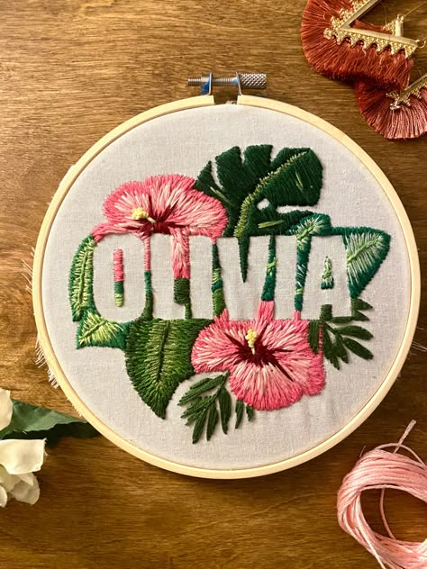 Olivia name negative space embroidery with tropical flowers Negative Space Embroidery Pattern, Negative Space Embroidery Letters, Tropical Embroidery Design, Negative Embroidery, Name Embroidery Ideas Letters, Olivia Embroidery, Name Embroidery Ideas, Embroidery Name Designs, Tshirt Embroidery Ideas