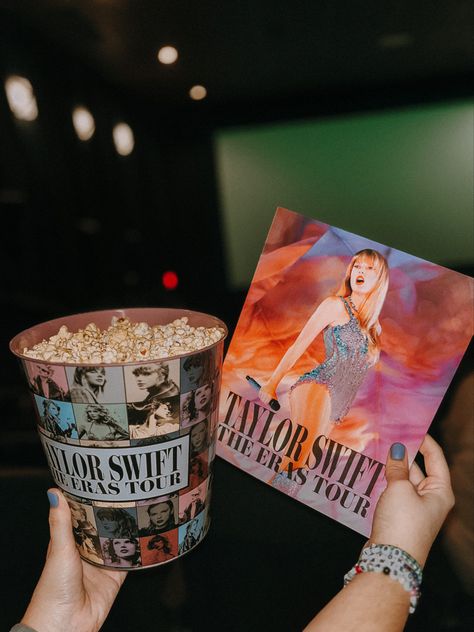 Taylor Swift The Eras Tour Concert Film, pink popcorn bucket, poster, friendship bracelet #TSerastourfilm #TStheerastour Taylor Nation #eras #taylorswift #amc AMC Theatres Taylor Swift Popcorn Bucket, Poster Friendship, Theatre Audience, Eras Tour Film, Eras Tour Concert, Taylor Nation, Pink Popcorn, Concert Ideas, Swift Concert