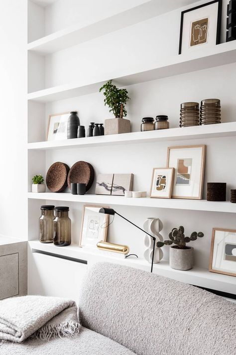 How To Make Your Shelves Look Like A Pinterest Board | Glamour UK High Wall Shelf Decorating Ideas, Wall Shelf Decorating Ideas, High Wall Shelf, Shelf Decorating Ideas, Shelf Decorating, Shelf Decor Living Room, Wall Shelf Decor, Wall Shelves Design, White Shelves