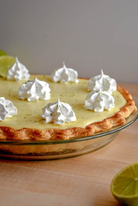 Best ever Key Lime Pie! Tart and sweet filling in a traditional pie crust. This authentic Florida pie is a delicious treat on a summer day. Tart Key Lime Pie Recipe, Traditional Key Lime Pie Recipe, Key West Key Lime Pie Recipe, Authentic Key Lime Pie Recipe, Key Lime Pie Recipe, Lime Pie Recipe, Frozen Pie Crust, Keylime Pie Recipe, Tart Filling