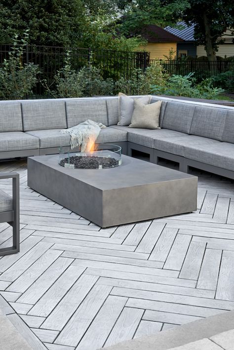 This backyard patio design is inspired by our Borealis patio slab. The look of hardwood flooring is now available outdoors with this wood look-a-like patio slab made of concrete. These patio stones are being called trompe-l’oeils by industry professionals will have you guessing whether it’s hardwood or concrete. Borealis looks and feels like wood planks, is offered in three alluring colors and most importantly, is maintenance-free. Check out our website to shop the look! Industrial Backyard, Stamped Concrete Floors, Decorative Concrete Patio, Concrete Backyard, Patio Grande, Concrete Patio Designs, Patio Pavers Design, Patio Slabs, Patio Inspiration