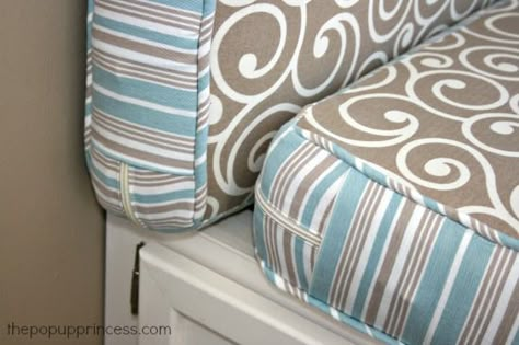 How to Reupholster the Cushions in Your Camper:  Wrap around zippers make it easy to get the cushion it and out of the cover for washing.  A neat pocket hides the zipper pull. Pop Up Princess, Camper Cushions, Camper Hacks, Rv Makeover, Travel Trailer Remodel, Camping Camper, Tent Trailer, Popup Camper, Camper Makeover