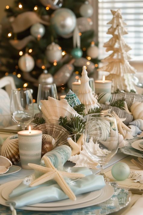 Bring the serene beauty of the seaside to your holiday meal with a coastal-themed Christmas table setting. Our article explores how to incorporate beachy elements into your decor, like seashells, driftwood, and soft blue tones. Use a white or sandy beige tablecloth as a base, and add touches of blue and green to mimic the colors of the ocean. For a festive twist, include ornaments in shades of turquoise and seafoam. It’s a refreshing and unique way to celebrate the holidays, perfect for those Coastal Christmas Table, Key West Christmas, Beachy Christmas Decor, Beachy Christmas Tree, Christmas Table Setting Ideas, Coastal Table Decor, Holiday Table Centerpieces, Table Setting Ideas, Christmas Table Setting