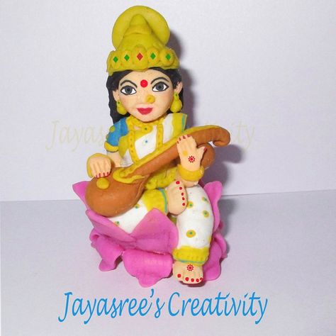 Lord Saraswathi from Jayasree's creativity Facebook page.  Procedure for making cold porcelain clay  Take 1cup cornflour, 1cup fevicol, 1teaspoon oil(u can use any oil..i prefer baby oil), 1 or 2 teaspoon vinegar or lemonjuice and finaly add one teaspoon of glycerin mix it well in a bowl and heat it slowly.... with continuous stirring with medium heat the dough will come out from the vessel .... take the dough from the pan transfer it on a clear and smooth surface coated with any cold cream(u ca Cold Porcelain Clay, Clay Modelling, Pot Painting, Kids Clay, Ganesh Ji, Clay Crafts Air Dry, Clay Craft, Cold Cream, Goddess Art