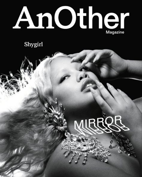 Black and white photo. Musician Shygirl, wearing earrings in gold-plated pewter and brass with rhinestones and beads from the Autumn 2022 haute couture collection by SCHIAPARELLI. Shygirl looks off to her right as her hair flows majestically behind her. Charlotte Wales, Maggie Nelson, Another Magazine, First Encounter, Magazine Cover Design, The Orator, Spring Summer 2023, English Roses, Digital Advertising