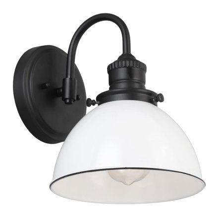 The Design House 588293 Savannah Wall Light features an effortless blend of rustic and modern farmhouse styles. A white metal shade with subtle black trim and a inchshepherdfoots hookinch arm finished in matte black creates an inspired look of simplistic charm. This downlight is designed for a single bulb and is the perfect accent light for your kitchen, hallway, or entryway.The Design House Savannah Wall Light is UL listed and comes with a 10-Year limited warranty that protects against defects Basement Rental, Farmhouse Wall Lighting, Farmhouse Wall Sconces, Rustic Wall Lighting, Sink Lights, Up Down Wall Light, Black Vanity Light, Rustic Wall Sconces, Indoor Wall Sconces