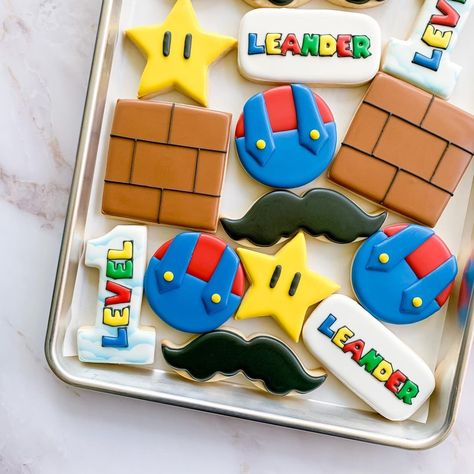 Nerdy First Birthday Party Ideas, Super Mario First Birthday, Mario Birthday Decor, Super Mario Sugar Cookies, Mario 1st Birthday Party, Mario Birthday Cookies, Super Mario First Birthday Party, Super Mario 1st Birthday Party, Mario First Birthday Party