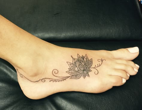 Lotus flower foot tattoo Flower Foot Tattoo, Ankle Foot Tattoo, Foot Tattoo Ideas, Wildflowers Tattoo, Small Lotus Flower Tattoo, Tattoos About Mom, Tattoos About Growth, Small Foot Tattoos, Small Wave Tattoo