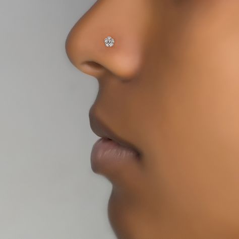 Beautiful tiny flower nose stud for pierced nose. Tribal, unique, ethnic, delicate design with high quality materials. Material options : Sterling silver 925 / 14k Gold plated on Sterling silver base (Use scrollbar to choose your material ) Diameter: 0.2 Inch - 5 mm Wire thickness: 0.8 mm - 20g *Nickel-free For more nose rings- https://www.etsy.com/shop/Umanativedesign?section_id=16881369&ref=shopsection_leftnav_6 We offer a range of septum rings, for pierced and non- pierced noses, made of Small Nose Studs, Flower Nose Stud, Tiny Nose Studs, Tiny Nose, Nose Piercing Stud, Small Nose, Gold Nose Stud, Dainty Style, Gold Nose Rings